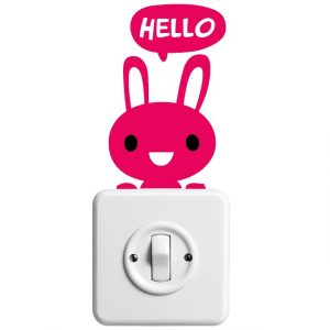 light switch with bunny sticker that says hello!